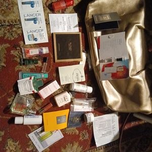 A gold Saks fifth avenue bag